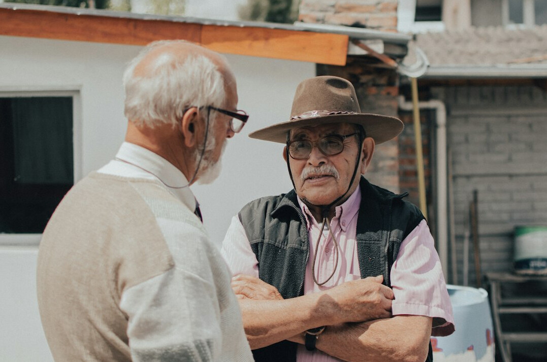 elderly man sharing story